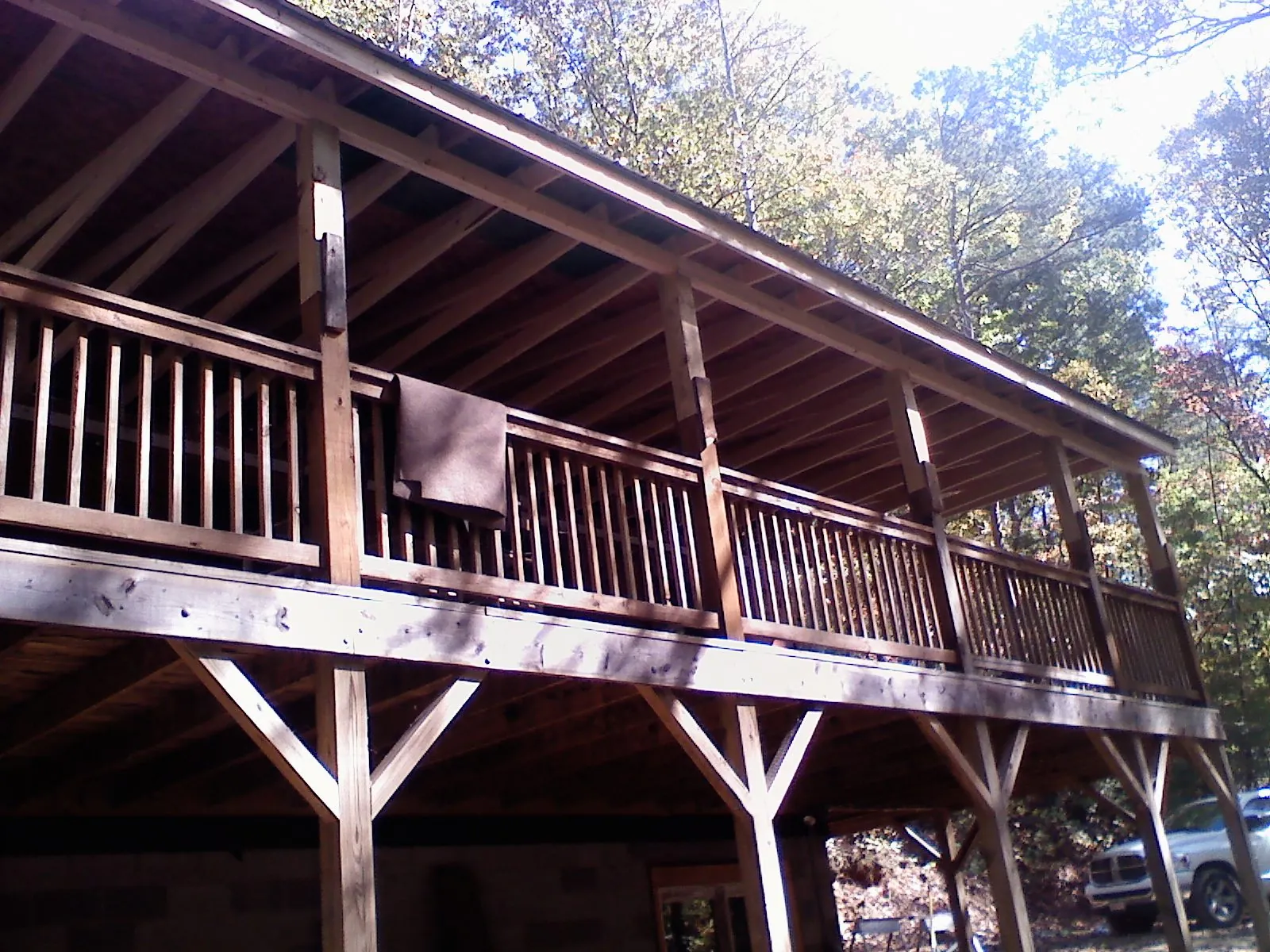 Timber framing under a new elevated porch and deck — Roof Leak Repair in Blackshear by Roofing Brothers